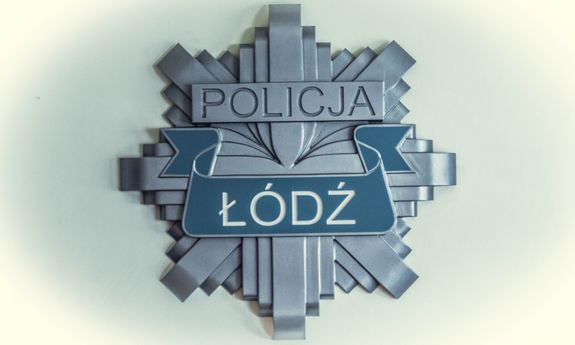 Logo policji w Łodzi, gwiazda policyjna z napisem Łódź.