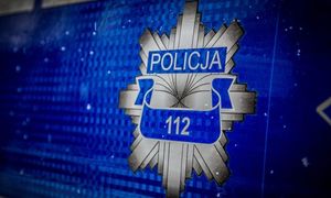 Gwiazda policyjna z numerem alarmowym 112.