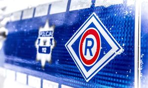 Oznaczenie Wydziału Ruchu Drogowego na drzwiach radiowozu.